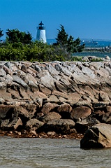 Bird Island Lighthouse Behind Rock Wall